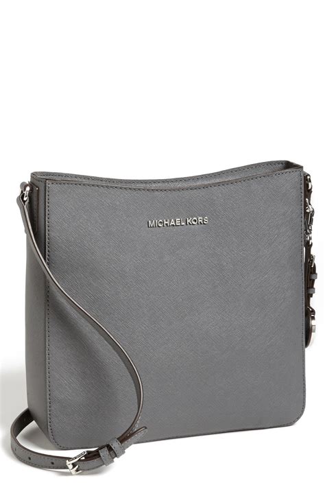 grey michael kors purse crossbody.